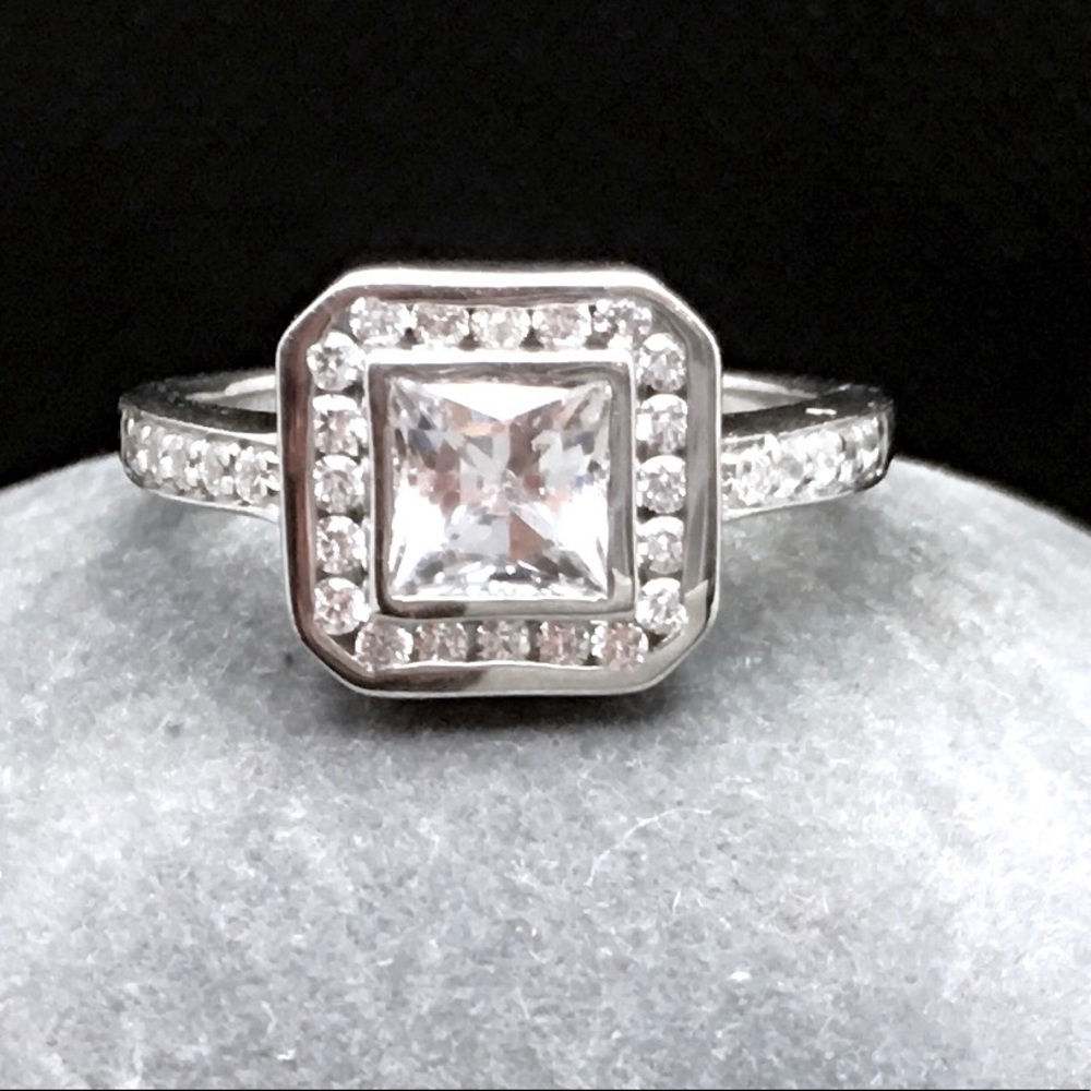Platinum Over Sterling Silver Halo Ring Made with Swarovski Zirconia